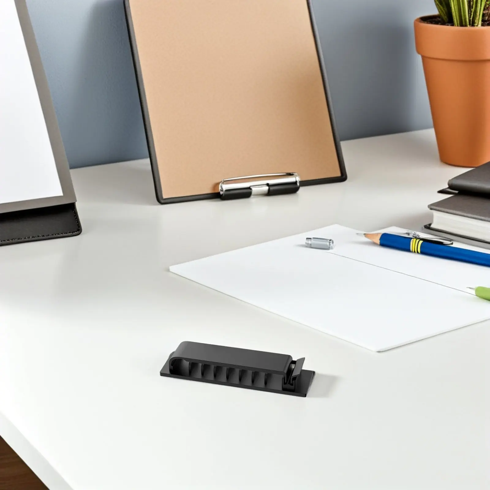 Multi-Slot Cord Keeper for Desk Walls