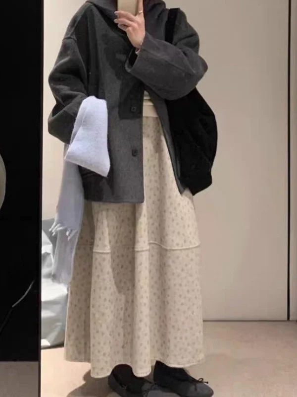 تنورة ميدي عالية الخصر على شكل حرف a مطبوعة بالزهور من الصوف للخريف والشتاء تنورة نسائية فضفاضة تناسب الخصر المرن