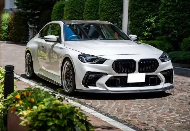 高品質PP素材ADスタイルフロントバンパー、ドライカーボンファイバーフロントリップグリル、フロントバンパーベント、M2 G87ボディキット用