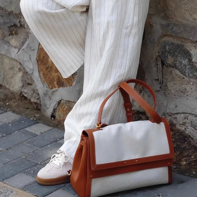 

2025 New Backpack Leather Commuter Tote Bag Large Capacity Bucket Bag Canvas Splicing Single Shoulder Handbag for Women