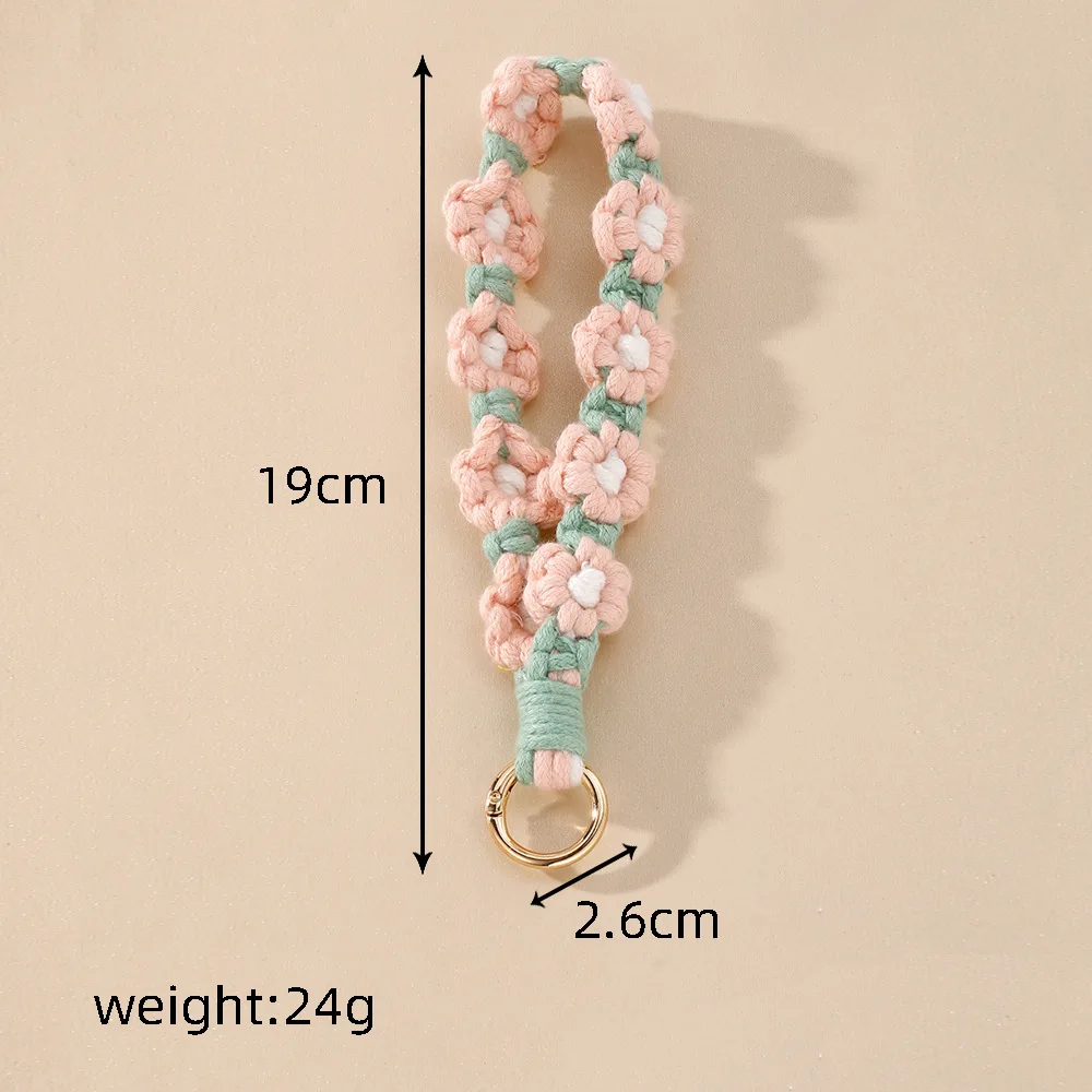 سلسلة مفاتيح معلقة على شكل زهرة الأقحوان يتم ارتداؤها على المعصم البوهيمي المنسوجة يدويًا على شكل زهرة سلسلة مفاتيح على شكل زهرة مزخرفة