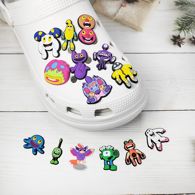 سلسلة كرتونية لألعاب موسيقى الوحش للأطفال ، سحر الأحذية ، إكسسوارات السدادة الكلاسيكية ، هدايا الديكور ، 15 في كل مجموعة