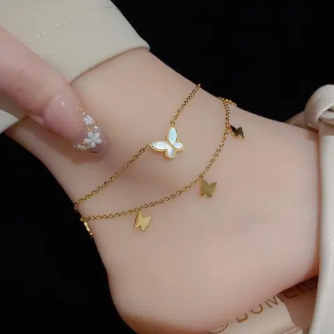 Tobillera de lujo ligera y moderna para mujer, pulseras de acero de titanio con diseño de mariposa y corazón elegante, accesorios de decoración para pies que no se decoloran