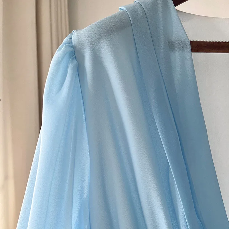 エレガントな花柄プリントの女性の V ネック長袖ドレス春秋自由奔放に生きるパッチワークフラワープリントカジュアルルーズマキシドレス