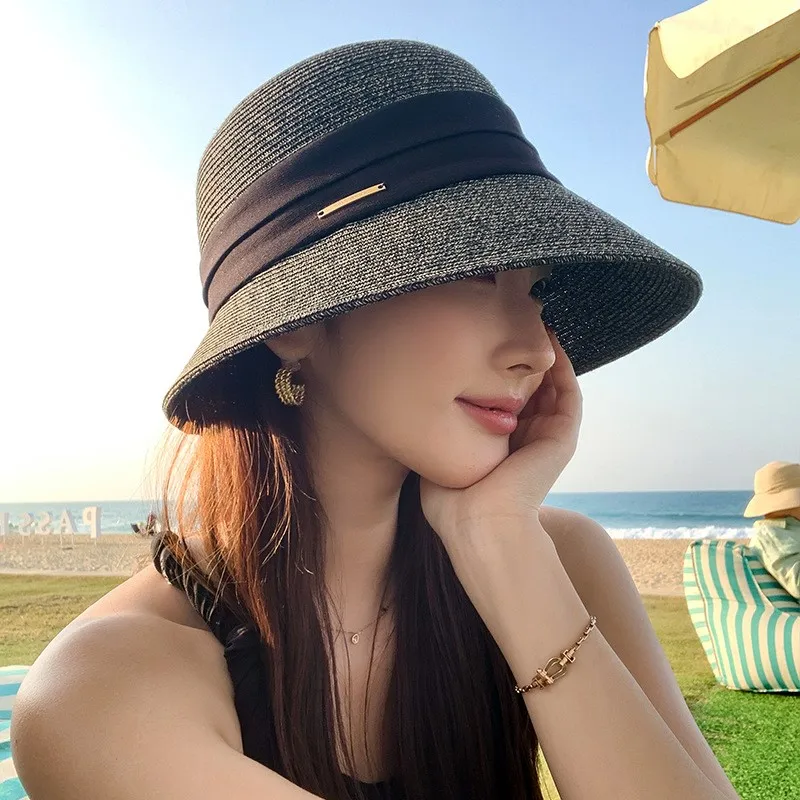 

A woman wearing hat exudes an elegant charm She can protect her face from the traveling also popular for travel