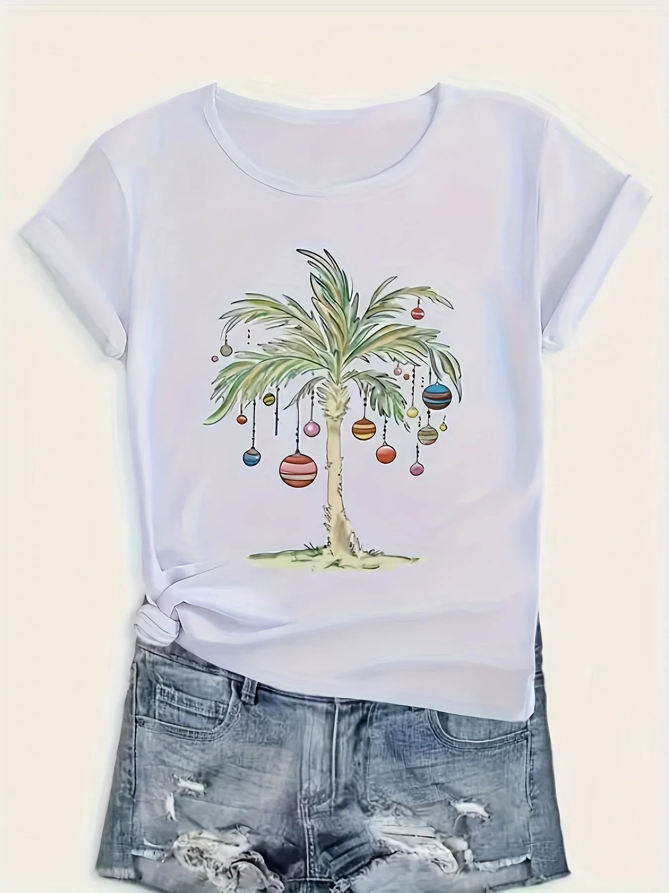 เสื้อยืดลายต้นปาล์มคริสต์มาสสำหรับสุภาพสตรี ตกแต่งด้วยกระดิ่งและของประดับเทศกาล