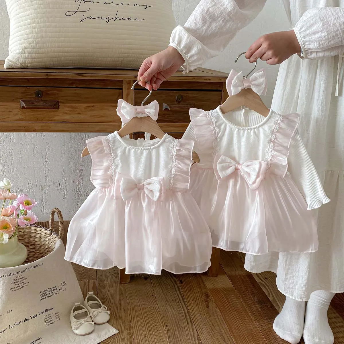 Baby spring outfit new jumpsuit for girls, stylish and fake two piece bow tie bag, fart mesh, Bai Tian Princess Romper