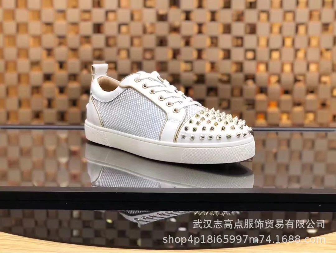 

European station men's shoes rivet board shoes trendy flat breathable orange couple casual fashion brand