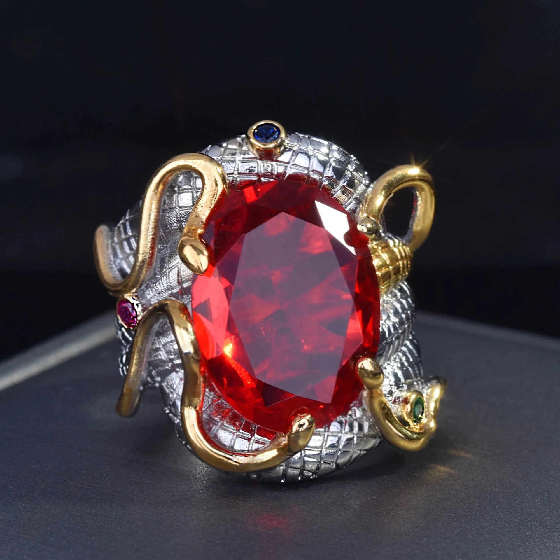 Serpentine retro two-color simulation Mozambican pigeon blood ruby colored treasure silver ring