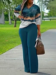 Plus size women's four-season small v-neck polyester fiber elasticated random printed knitted long-sleeved trousers casual suit。
