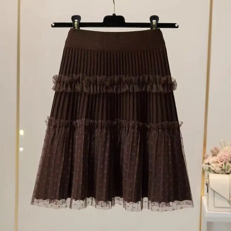 Nuevo 2026 Mini falda de malla de moda Falda corta de punto empalmado para mujer primavera otoño media longitud faldas con volantes de gama alta para mujer
