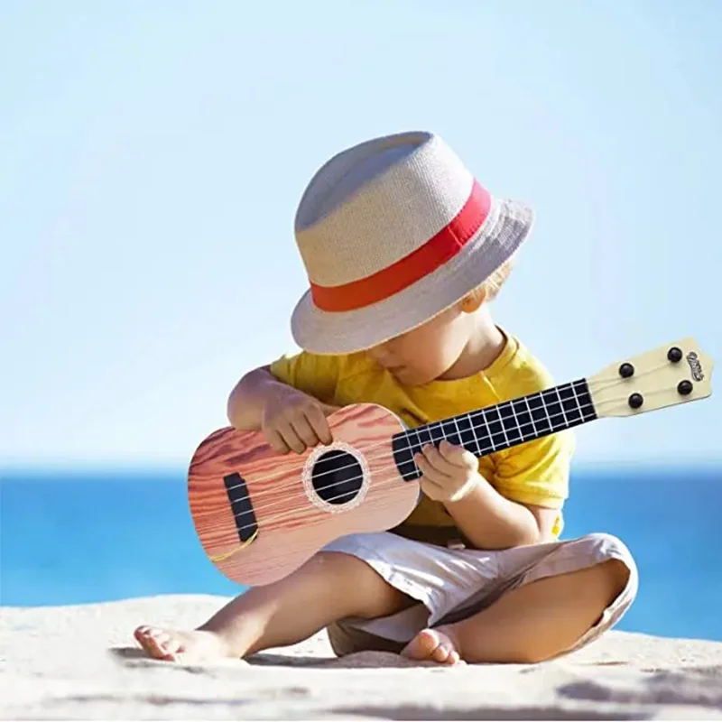 Mini Guitarra Clásica de 4 cuerdas para niños, instrumento de juguete para principiantes, simulación de juego, Enseñanza Temprana, guitarra pequeña