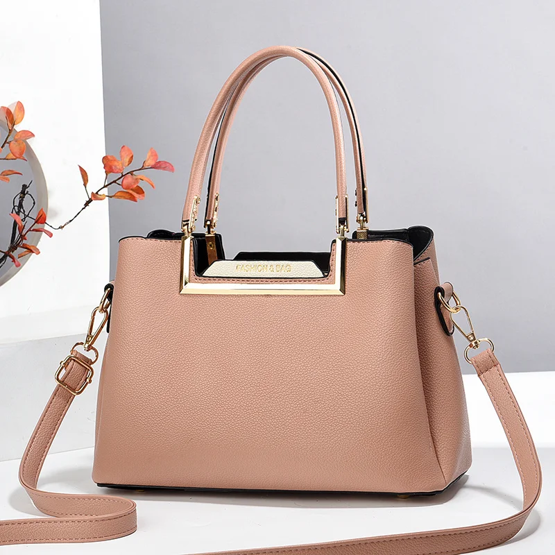 

Элегантная кожаная сумка для подгузников для женщин: минималистичная винтажная сумка через плечо, роскошная дизайнерская сумка-тоут однотонного цвета, большая вместимость.