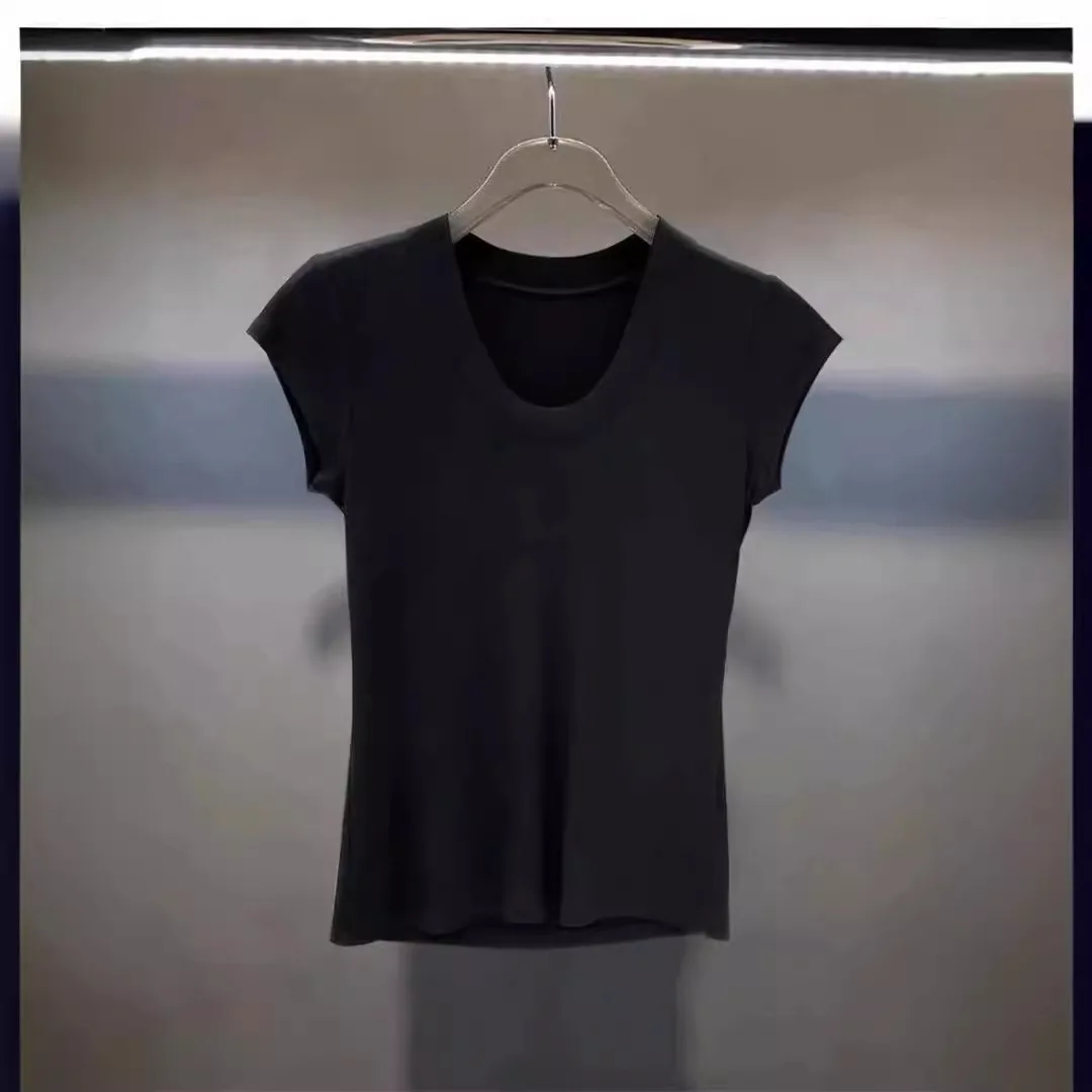 Camiseta blanca de manga corta acanalada con cuello redondo para mujer, un estilo único para verano de 2025, top ajustado de algodón puro