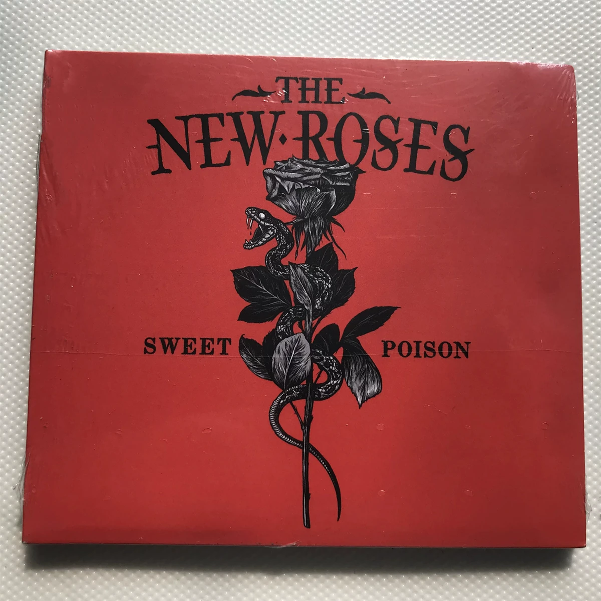 

Rock The New Roses Norman Bites Music CD Greatest Hits Album Dead of Night Music Record Cosplay Walkman Car Soundtracks Box Gift
