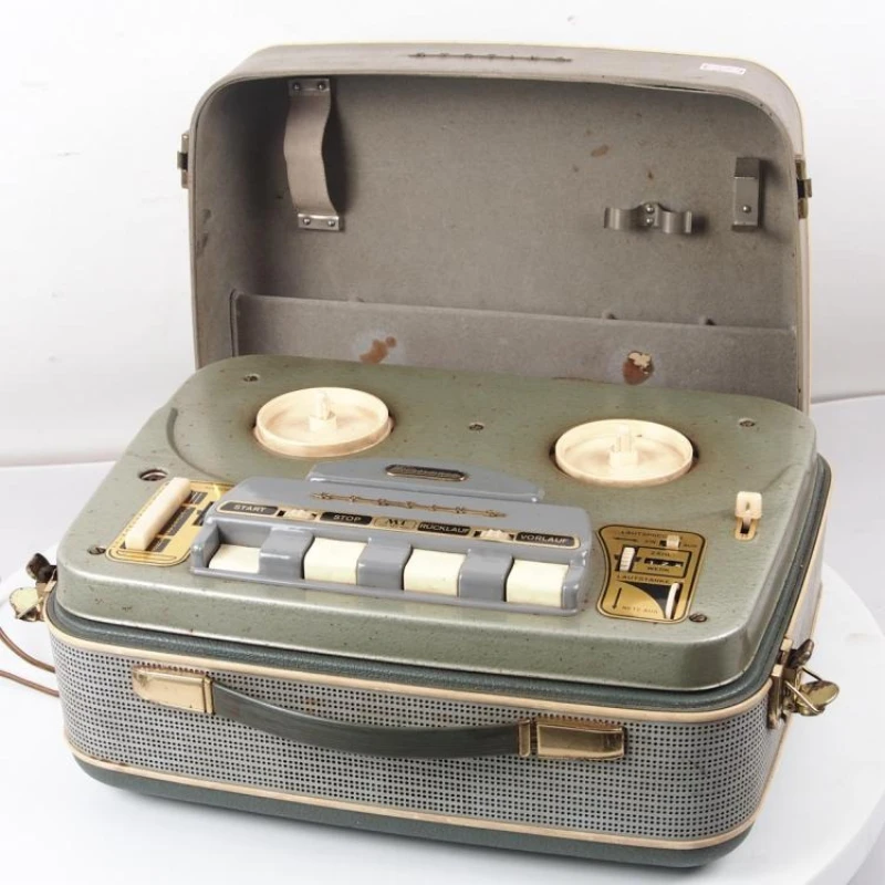 Western antiques 1960s German old-fashioned open tape recorder open disk machine failure machine