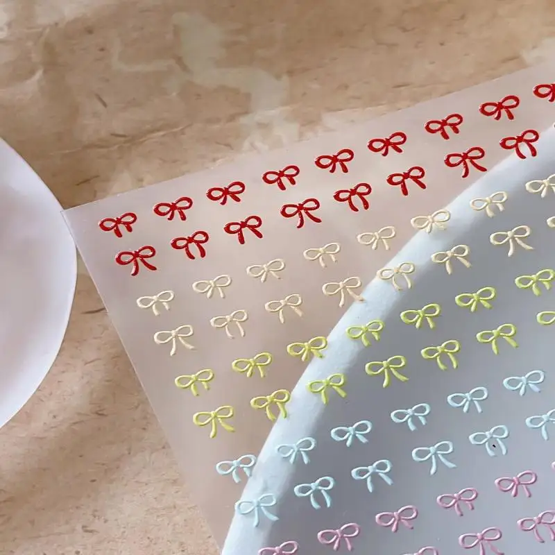 1 foglio colorato piccolo fiocco adesivi per nail art colore misto sollievo carino bowknot pendenti per unghie fiocco accessori per la decorazione manicure fai da te