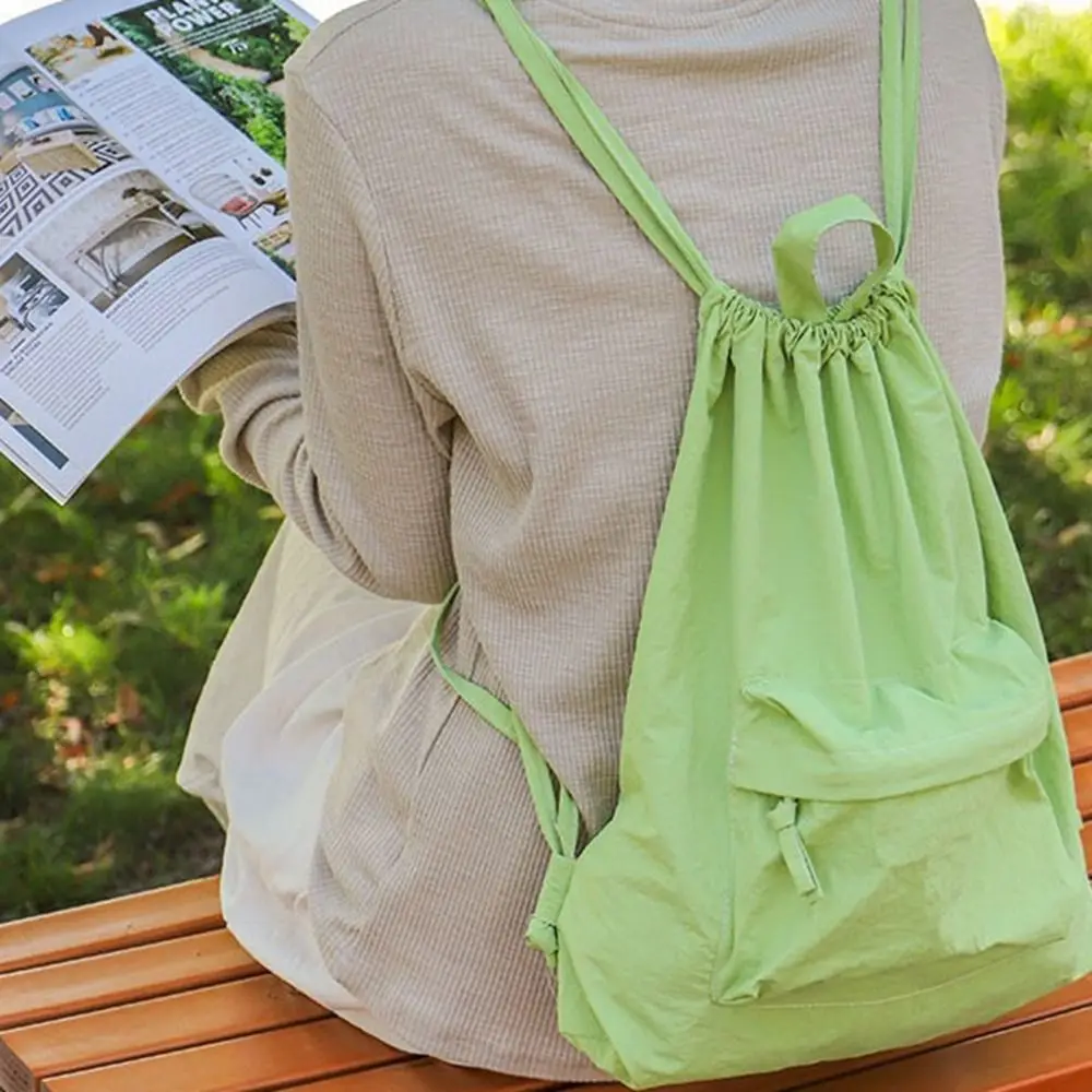 

Casual Korean Style Drawstring Backpack Commute Portable Type Nylon Backpack Solid Color Niche Design Cloth Shoulder Bag Travel