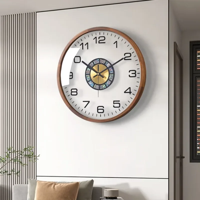 

About modern light luxury solid wood wall clock living room clock wall hanging high-end fashion new Chinese clock