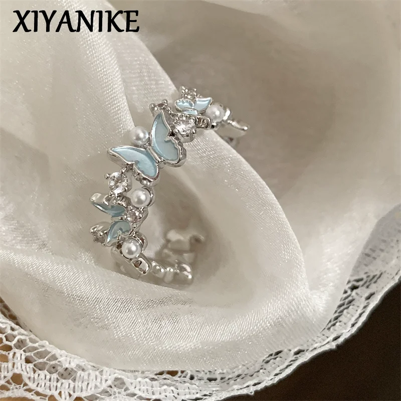 

XIYANIK Gentle Pearl Butterfly Adjustable Opening Rings For Women Girl Fashion New Jewelry Gift Party Wedding Wholesale anillos