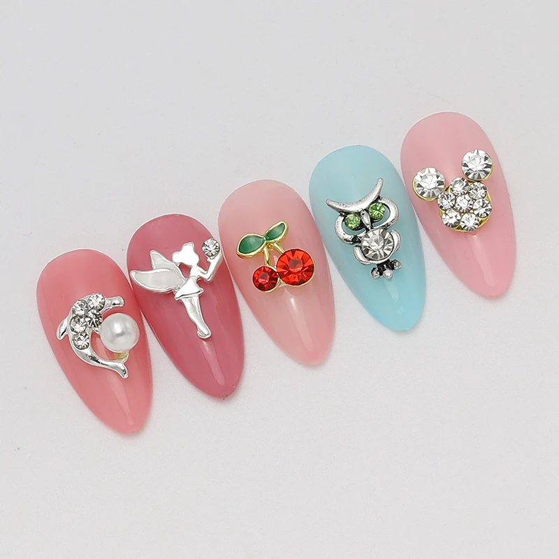 100 pieces of nail art decorations made of gold and silver alloy, featuring cute cherry dolphins and owls. DIY nail charms.