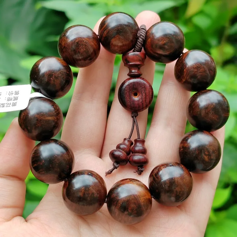 

Factory Wholesale Imitation Hainan Huanghuali Wooden Bracelet for Men and Women Cultural Artifact Prayer Beads Bracelet2.0