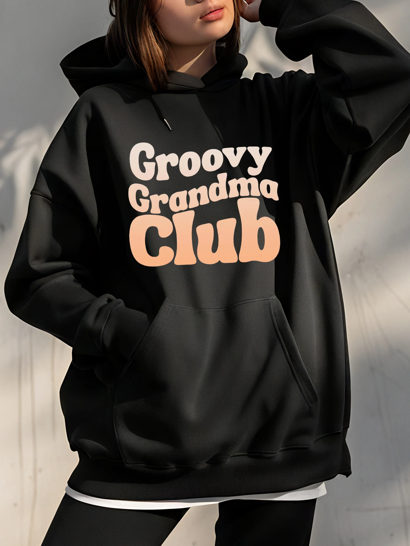 Groovy Grandma Club Hoodie with Bold Text Print and Front Pocket Design for Casual Wear