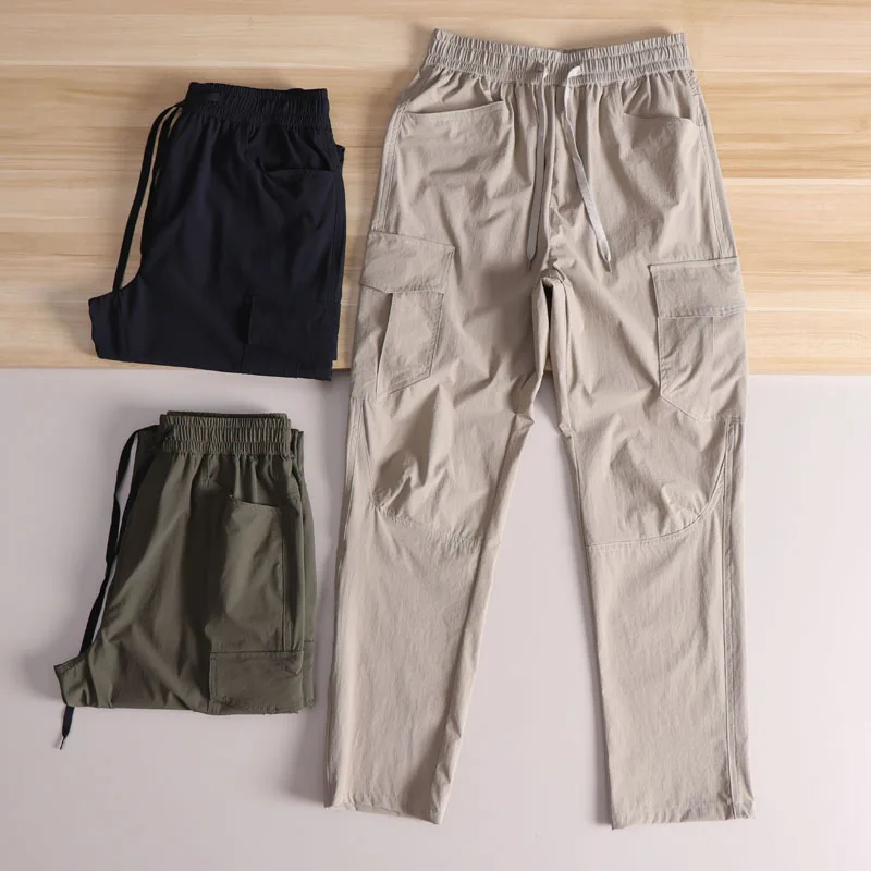 

Waterproof Windproof Comfortable Breathable Spring Summer Thin Outdoor Men's Elastic Waist Multi-ket Straight Leg Work Tro...