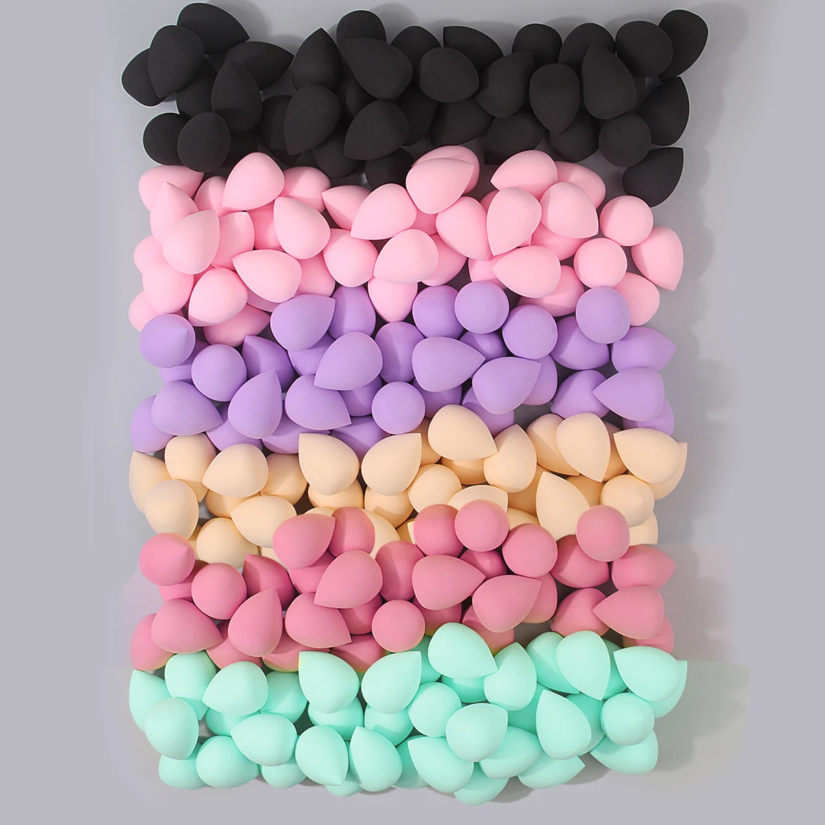 100 SZTUK super miękkich, dużych gąbek do makijażu, jajko kosmetyczne, narzędzie do makijażu, które rozszerza się po nawilżeniu, bez przyklejania się pudru.