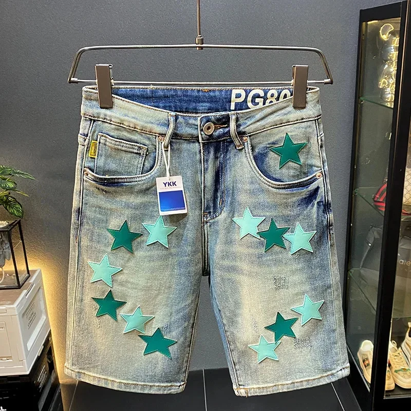 

2026 summer denim shorts for men, fashionable high-end star decal design trend, slim fit straight leg five quarter pants