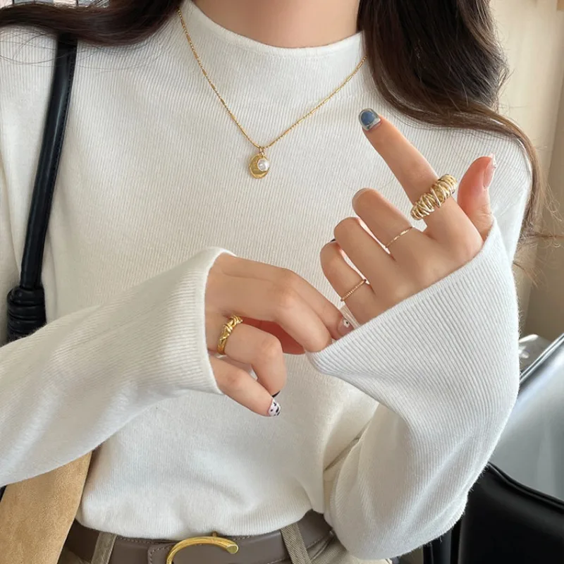 เสื้อสเวตเตอร์ไหมพรมคอเต่า แขนยาว สีดำ สำหรับผู้หญิง รุ่น Q2859