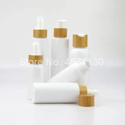 

whosesale luxury bamboo lotion pump cap white empty plastic pet shampoo lotion bottle with bamboo disc top cap bamboo spray cap