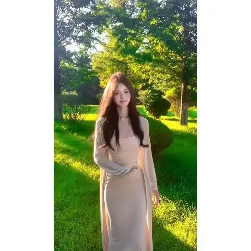 فستان طويل مثير بقصة ضيقة ومجموعة سترة محبوكة للنساء لربيع وصيف نمط جديد خفيف الوزن تنورة بحزام رائج