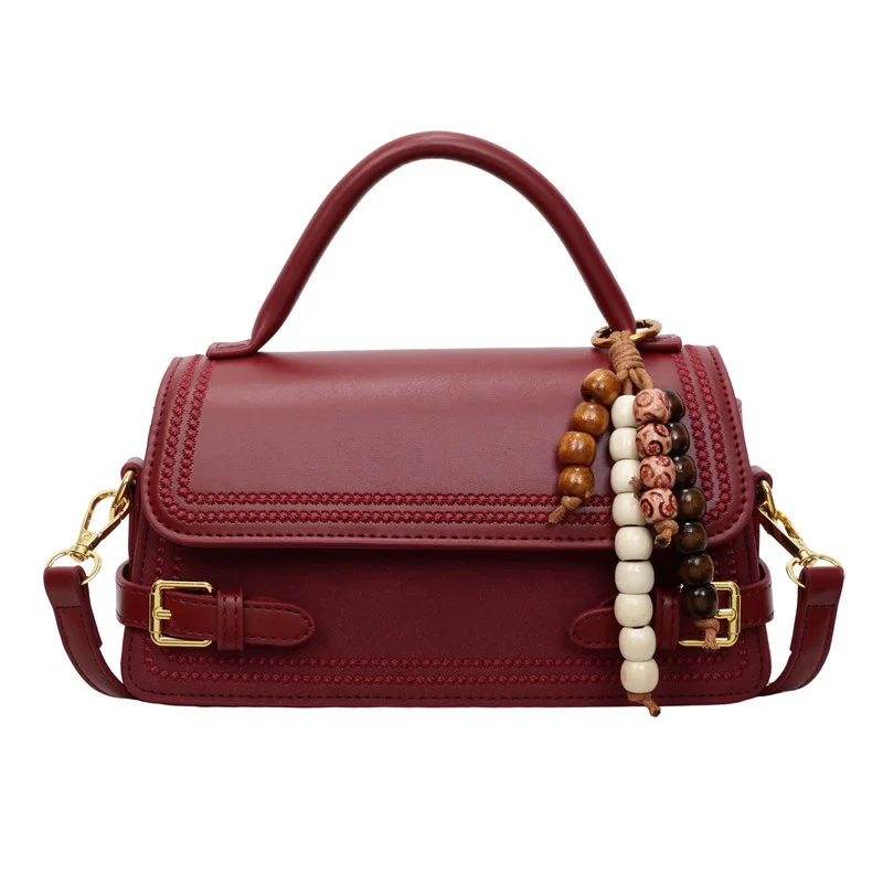 Bolso de mano de cuero burdeos para mujer con asa superior, dije de cuentas, hebilla retro, bandolera, herrajes dorados, bolso casual diario