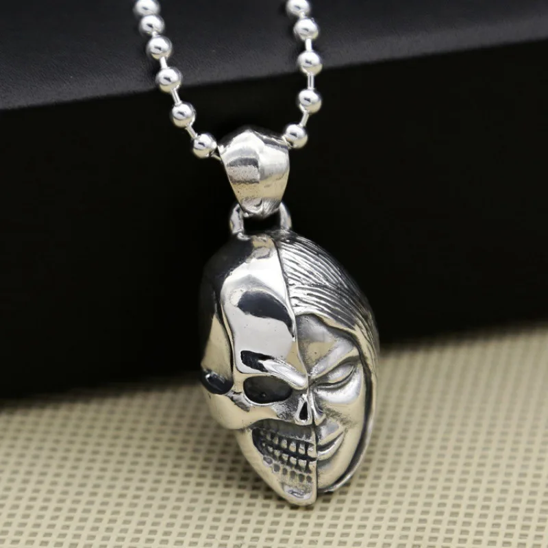 

Wholesale S925 sterling silver ornament fashion creative double-sided devil half face Skull punk popular men and women pendant