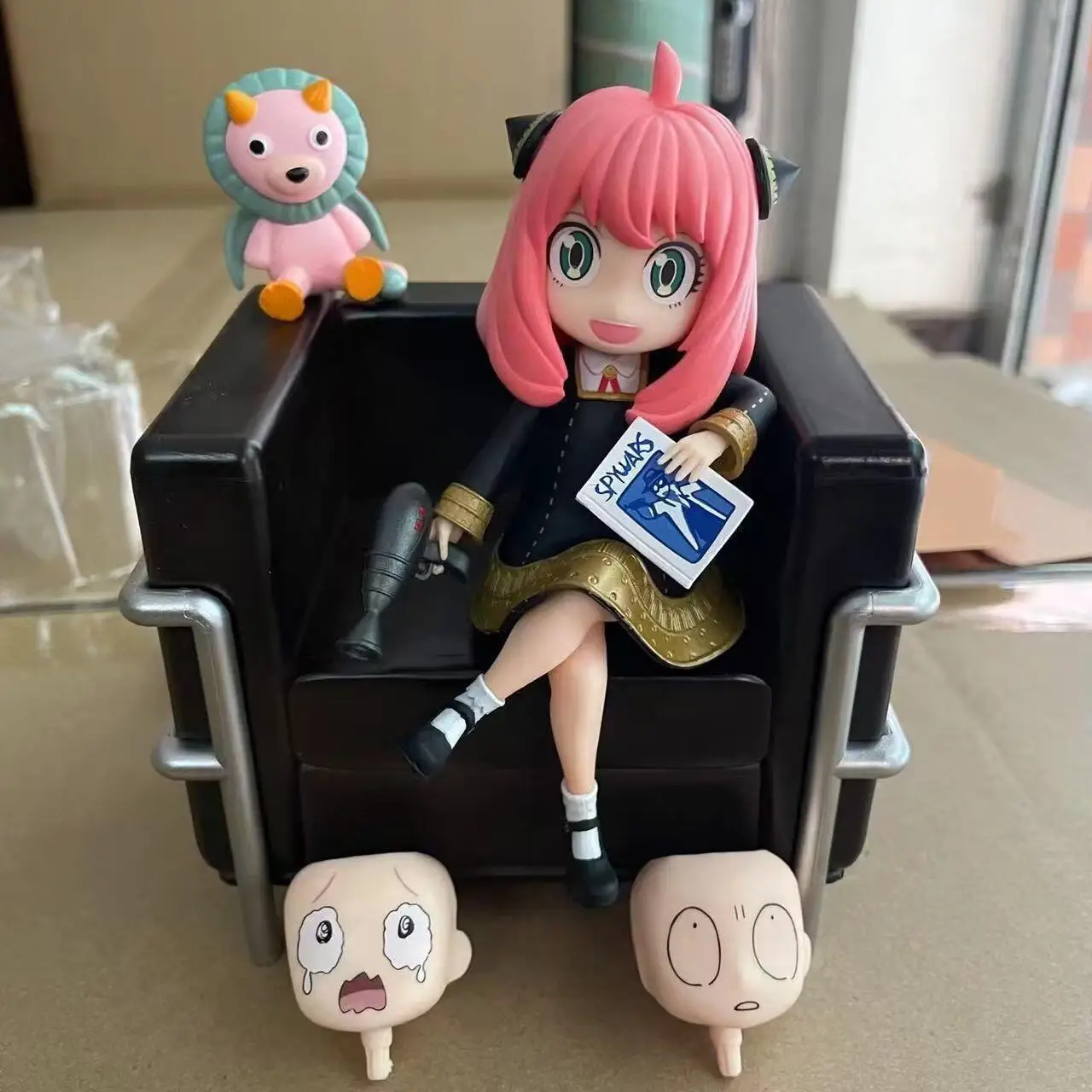 

Adorable Spy Dollhouse Sofa - Egg Cry Face Ania Sofa - Handcrafted Model with Replaceable Face in a Box