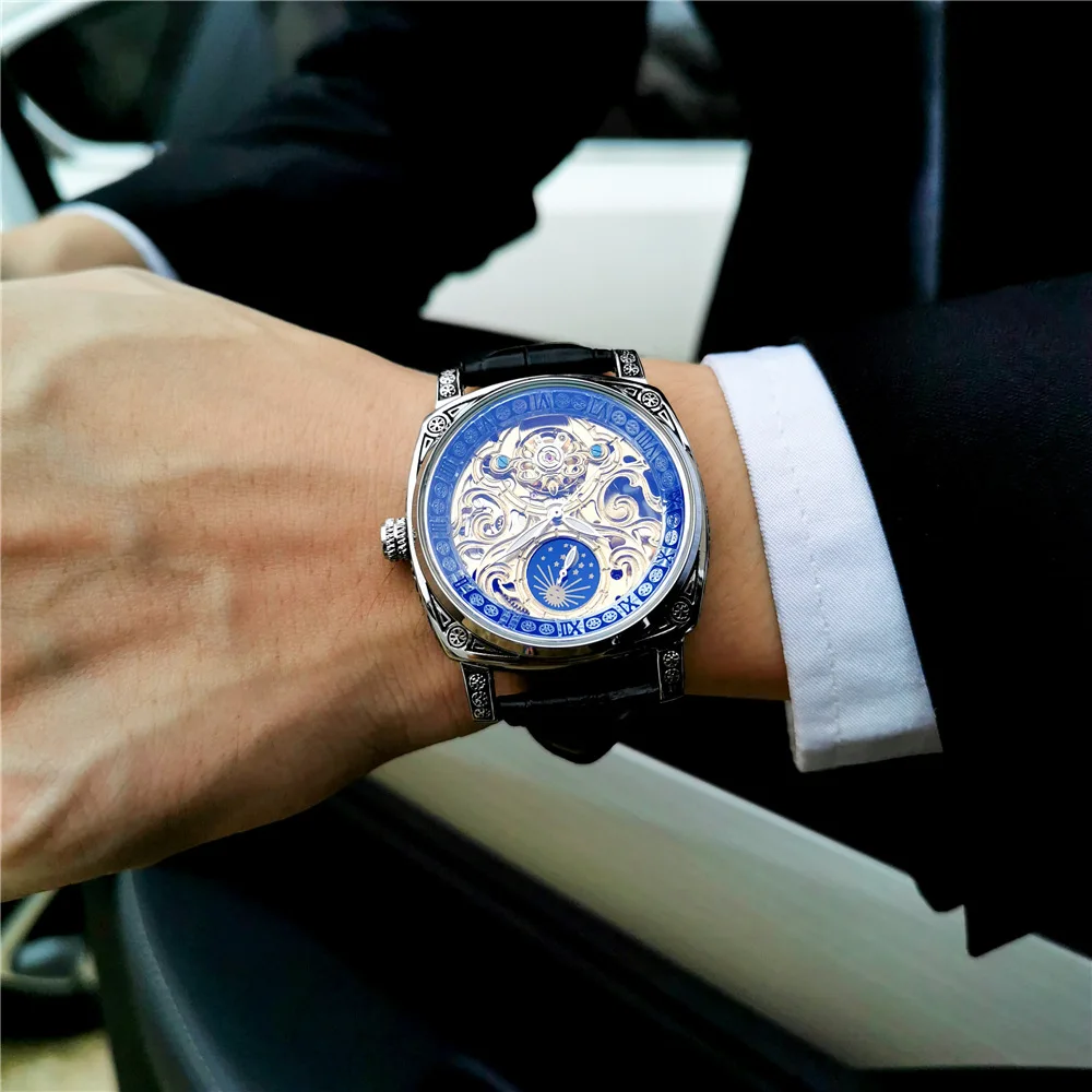 AOKULASIC montre mécanique automatique pour hommes squelette voir à travers le dos lumineux Phase de lune bracelet en cuir lumière bleue