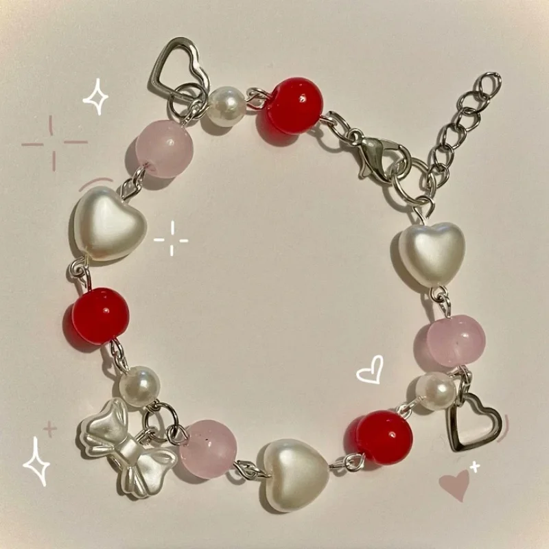 strawberry shortcake cluster charm bracelet red pink pearl coquette bow，pure handmade，fashion exquisite，easy to wear, with any c