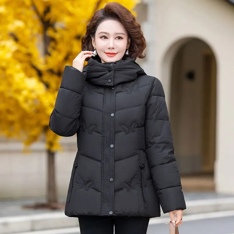 سترة شتوية جديدة 2025 ملابس خارجية على الطراز الكوري سترة فضفاضة متوسطة الطول مبطنة بالقطن مع جيوب ملابس خارجية عصرية TS461