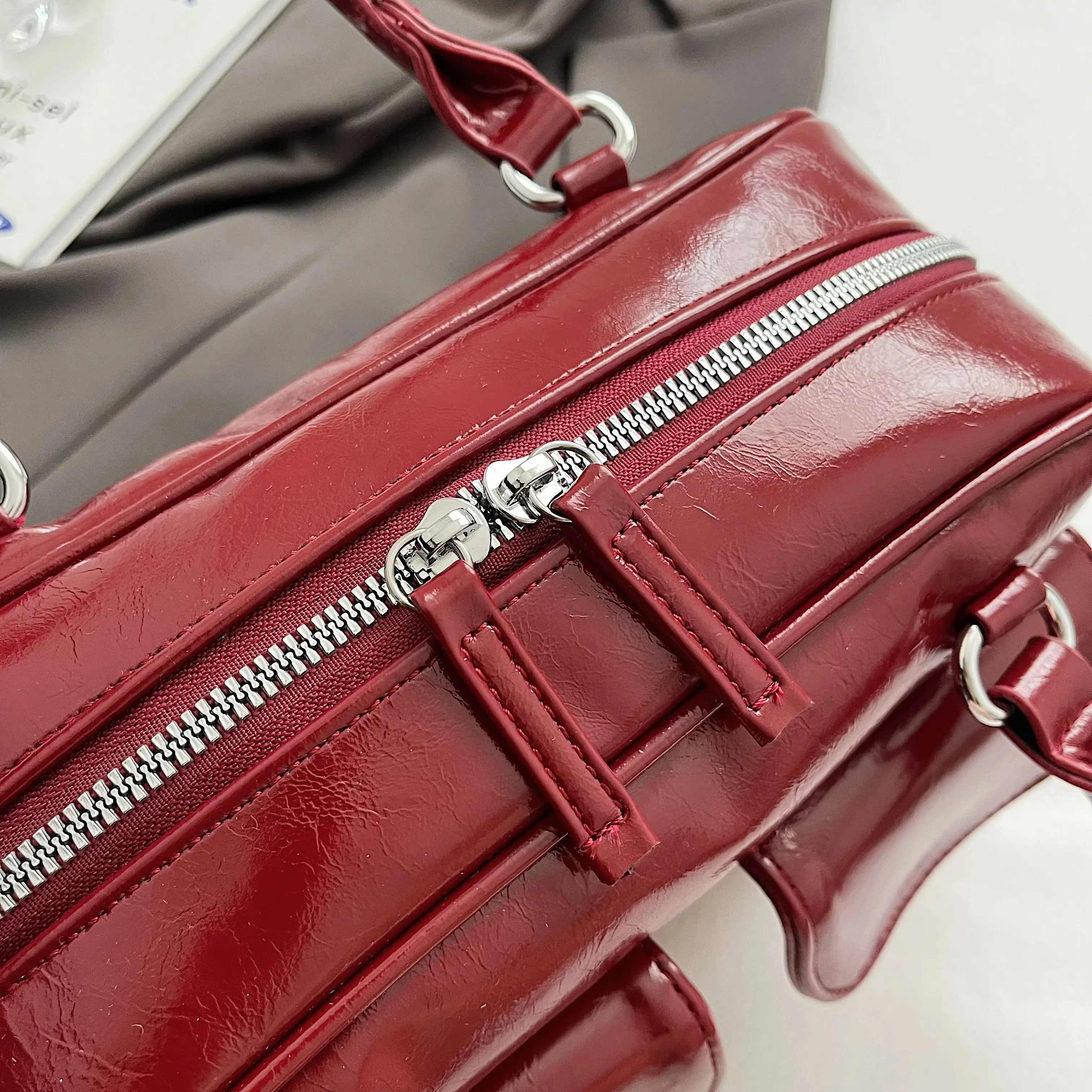 حقيبة القوس العصرية تحت الإبط للنساء 2024 الطبعة الكورية الجديدة بسيطة الترفيه وسادة حقيبة العصرية حقيبة كتف متعددة الاستخدامات