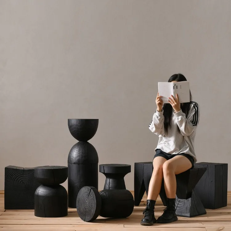 

Japanese-style wabi wind carbonized wooden pier fire edge log coffee table designer low stool homestay creative ornament