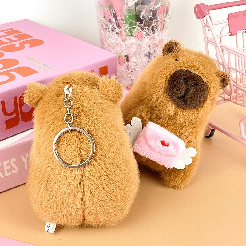 لطيف كيوبيد كابيبارا أفخم المفاتيح محشوة دمية على شكل حيوان كيرينغ حقيبة قلادة على ظهره معلقة الديكور زوجين مفتاح حامل