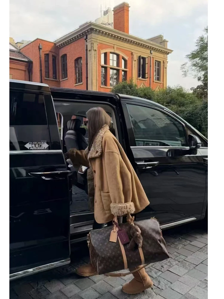 الرجعية Sle المرأة طويلة Sve Jaet فضفاضة تناسب زر واحد إغلاق الدافئة الجلد المدبوغ معطف فرو الضأن Dongda بوابة خمر الرياح