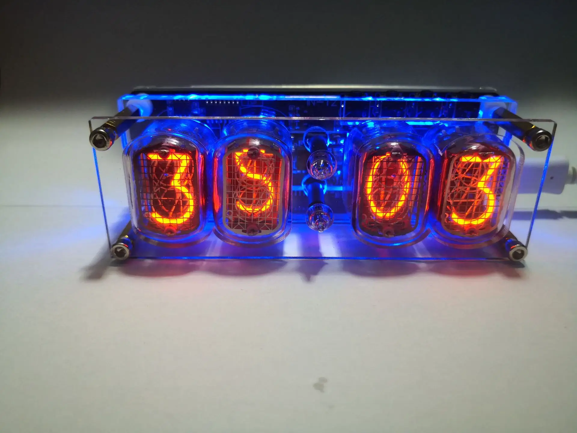 

Hot-selling IN-12 glow clock finished 4-bit clock colorful LED retro clock