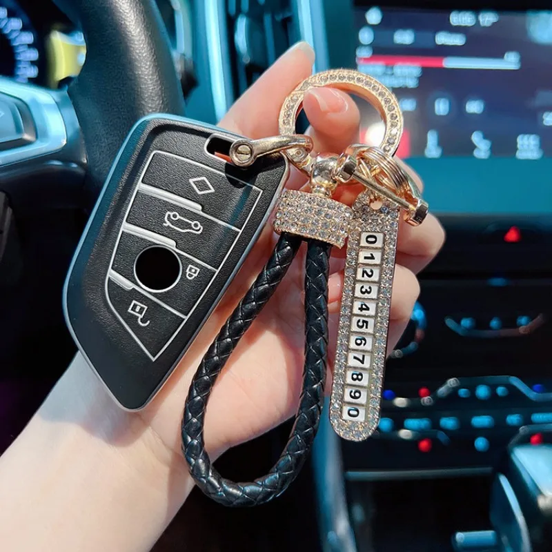 Creative and fashionable car keychain, leather handmade woven rope, full of diamonds, number plate, anti loss keychain ring