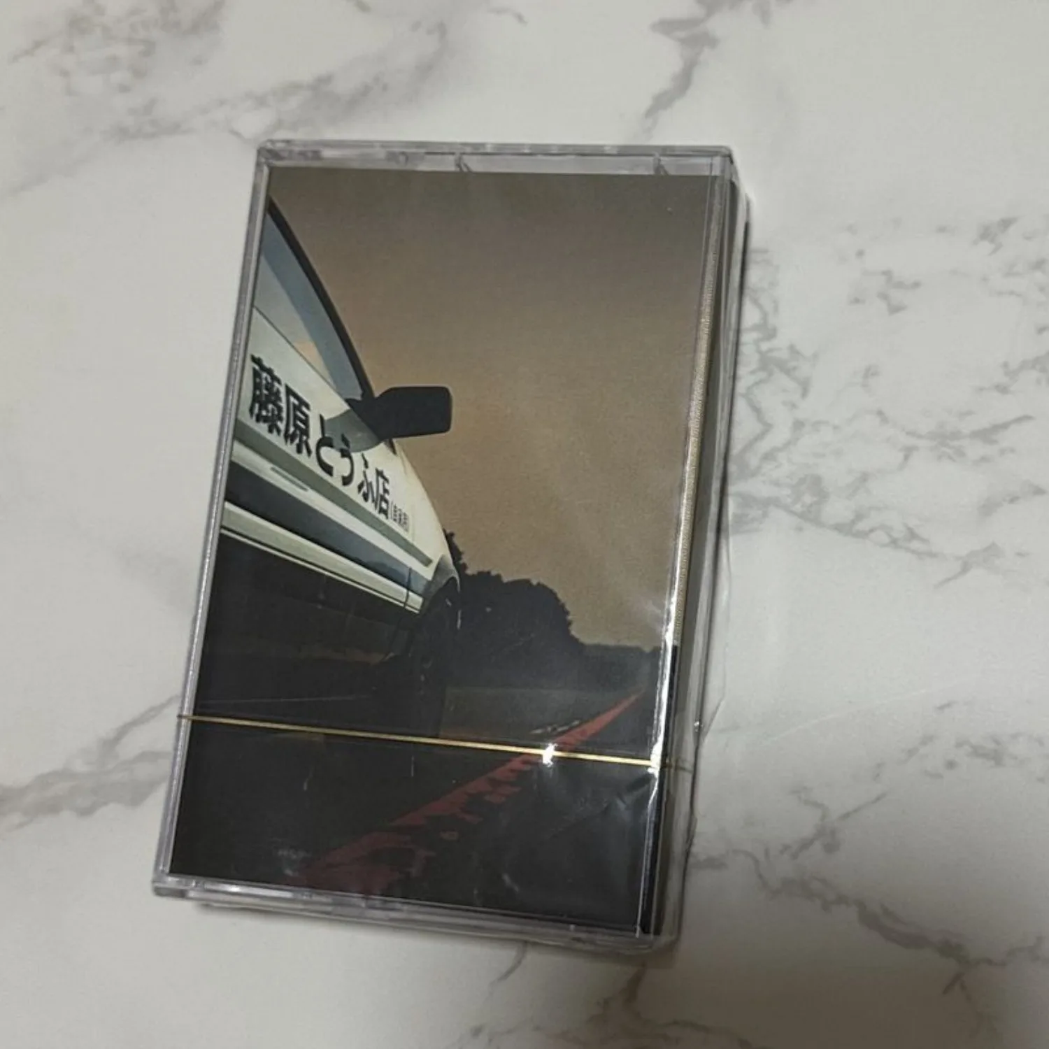 Cassette de musique d'animation de course classique, format rétro nostalgique, réédition de chanson d'ouverture énergique, idéale pour les collectionneurs