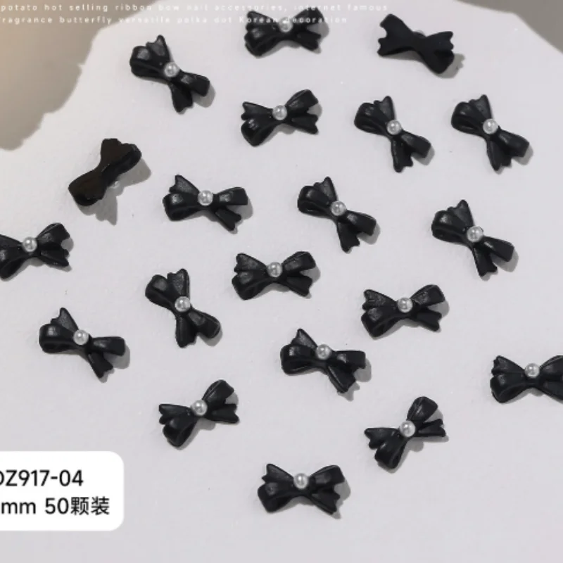 新しいリボンボウネイルアートアクセサリー、ブラックドットバタフライボウ、コンボウタイネイルチャーム、フラットバックレジンネイルラインストーンデコレーション