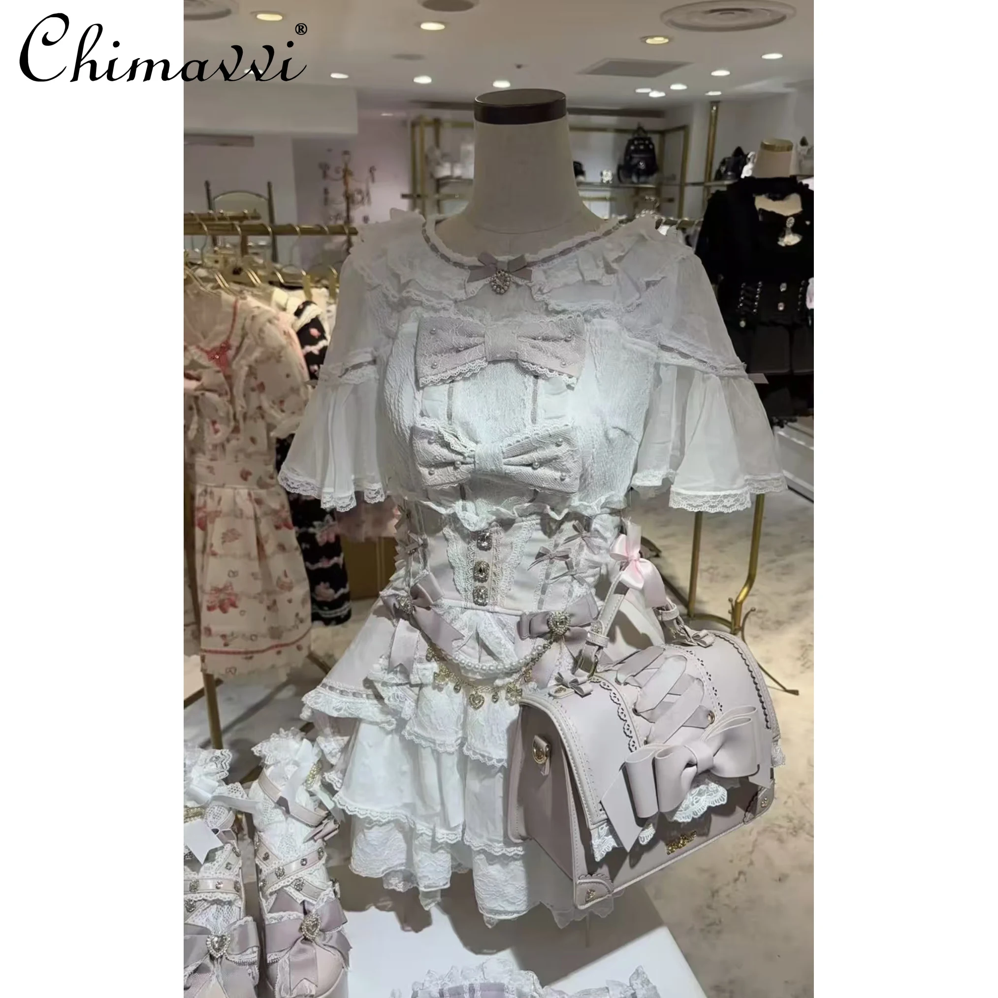 ญี่ปุ่นลิซน่ารักเพชรปุ่มโบว์มุกลูกปัดคอเสื้อหวานสาวหวานแขนสั้นเจ้าหญิงโลลิต้าเสื้อ