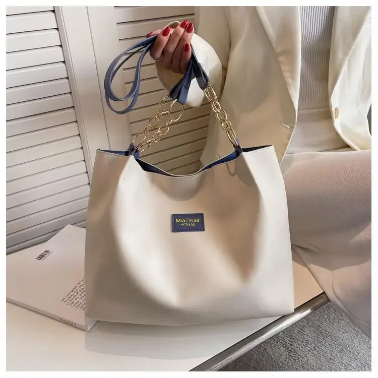 Bolso de hombro con textura Simple para mujer, bolso de mano de viaje, gran capacidad, a la moda, nuevo