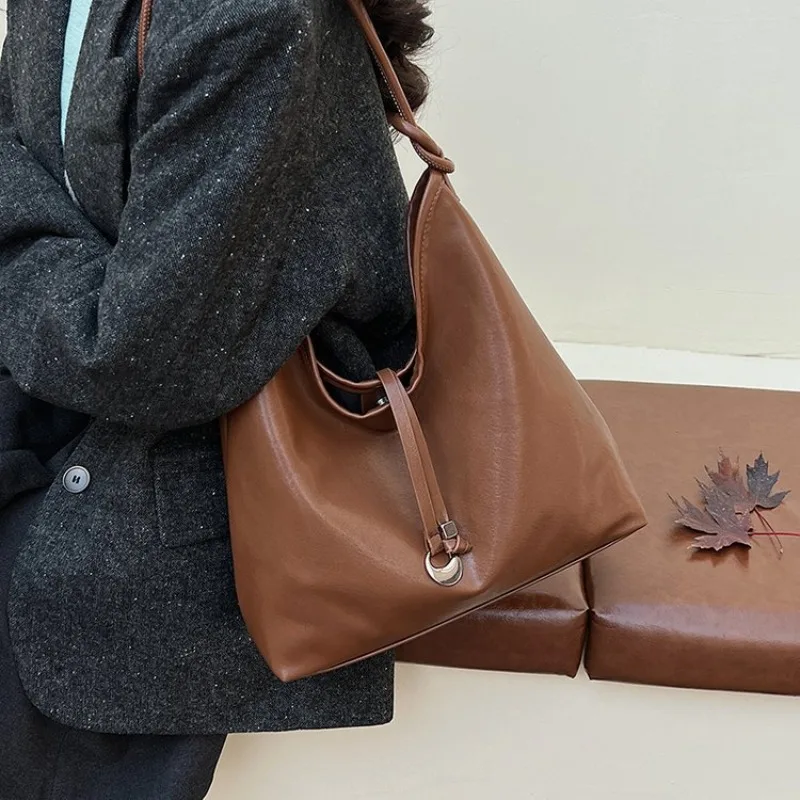 

Модная повседневная ретро-сумка через плечо для стильных женщин: элегантный и индивидуальный дизайн, премиальная прочная ткань, идеально подходит для ежедневных поездок.